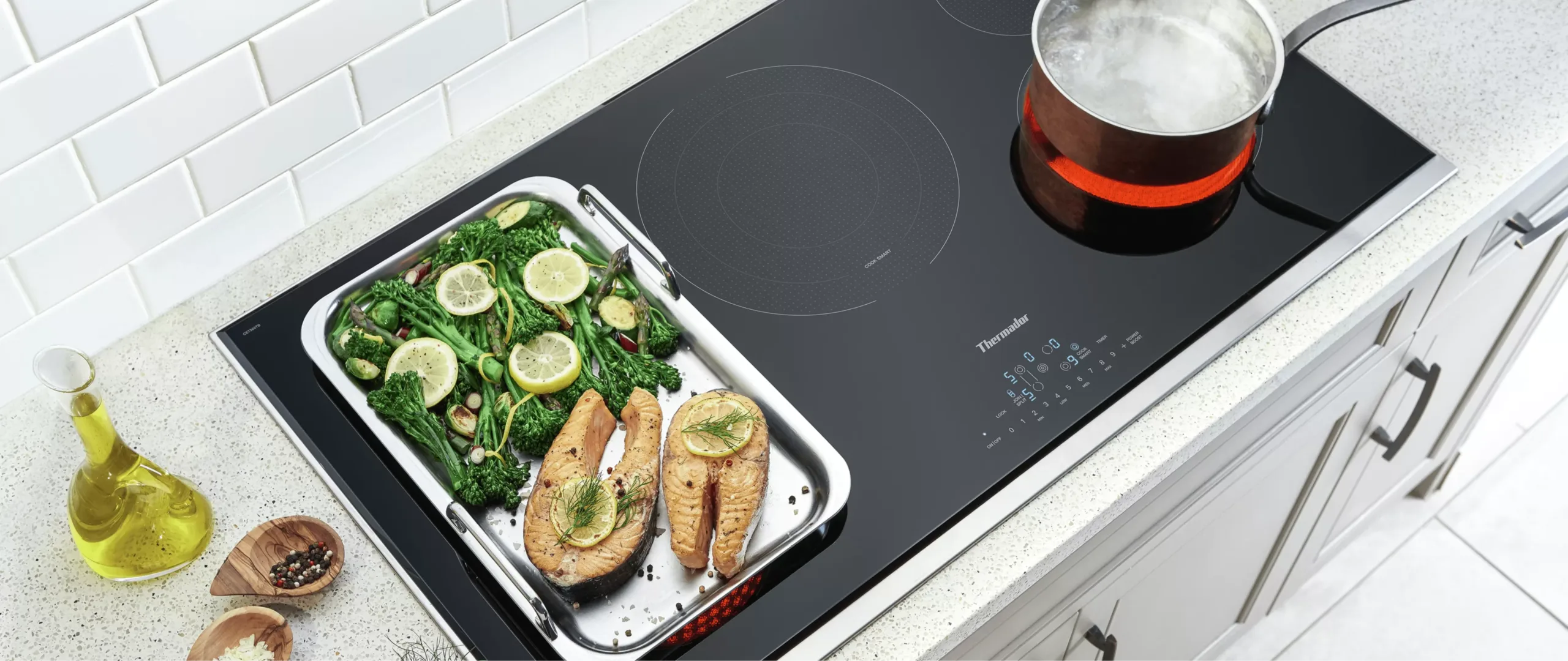 thermador_36_inch_electric_cooktop_touch_control_panel_styled_food_pot_boiling_water